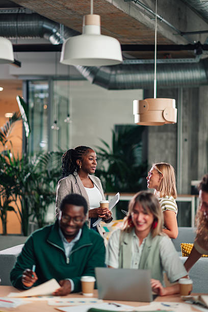istock Diverse business professionals collaborating in a modern office space 2246252927