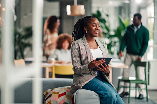 istock African american businesswoman using digital tablet in modern office 2246252938