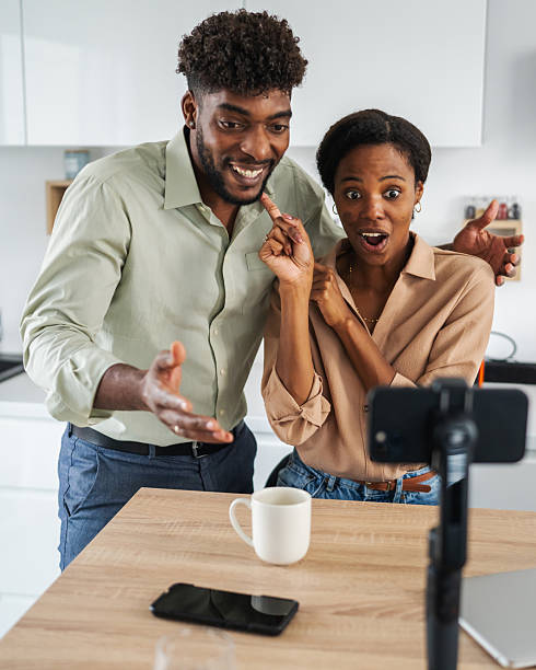 istock Happy young black bloggers couple creating online content 2246253690
