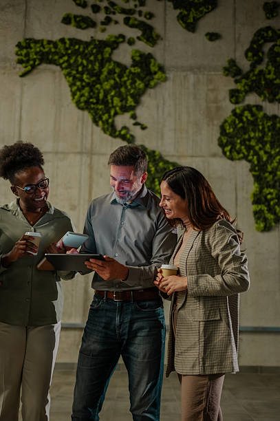 istock Diverse business team collaborating using digital tablet and smartphone 2246253918