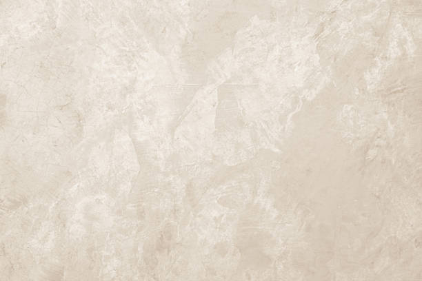 istock Concrete wall texture background. Close up retro plain cream color cement wall background texture. 2246253955