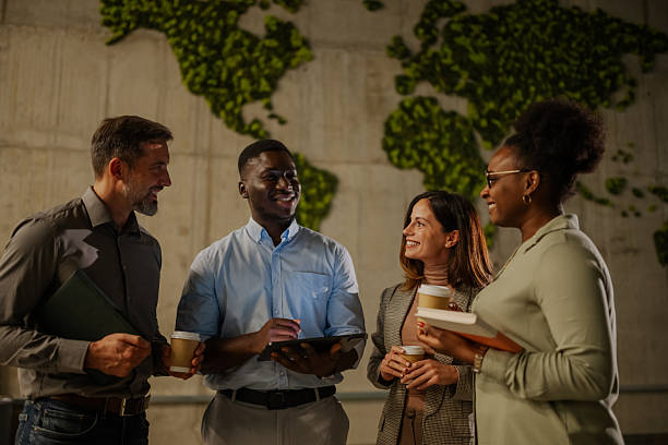 istock Diverse business team having break talking in office 2246254057