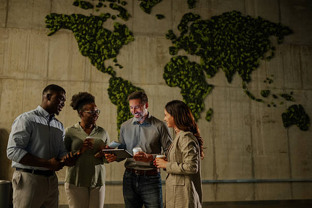 istock Diverse business team collaborating global sustainability project 2246254116