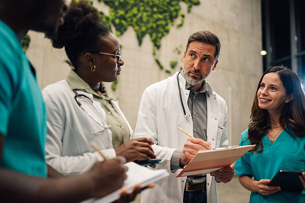 istock Medical team collaborating discussing patient care 2246256422