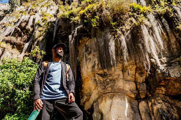 istock Mid adult man admiring the view on forest 2246257614