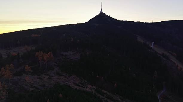 istock peaceful twilight scene showing solitary mountain communications antenna against glowing evening sky 2246260385