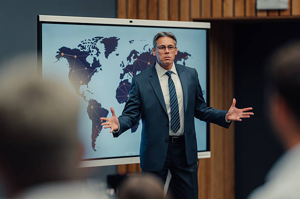 istock Businessman giving presentation about global network and business strategy 2246260387