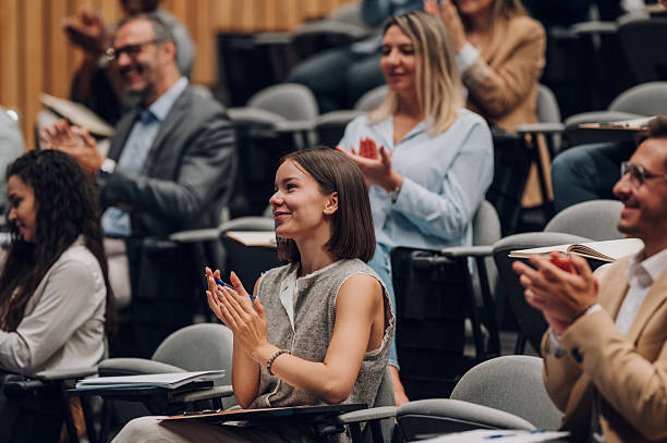 istock Audience clapping during business conference or seminar 2246260417