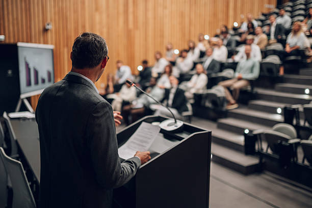 istock Speaker presenting to an audience during a business conference 2246260600