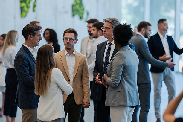 istock Business people networking at a corporate conference event 2246260621