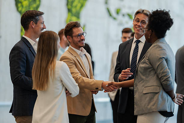 istock Business professionals shaking hands cementing a partnership 2246260624