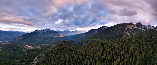 istock Panoramic Mountain Valley in British Columbia With Dense Forests Under Dramatic Sky 2246260630