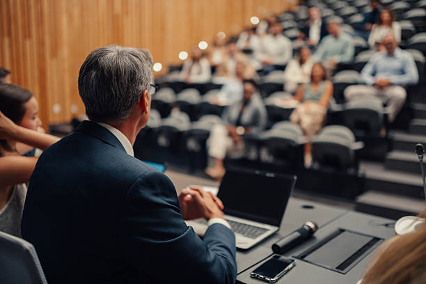 istock Speaker presenting to audience at business conference 2246260646