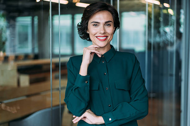 istock Confident businesswoman in modern office. 2246260771