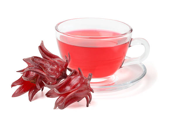 istock Roselle water in a clear cup . 2246261120