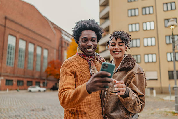istock Joyful young people sharing a moment in Berlin streets during a pleasant day 2246263937