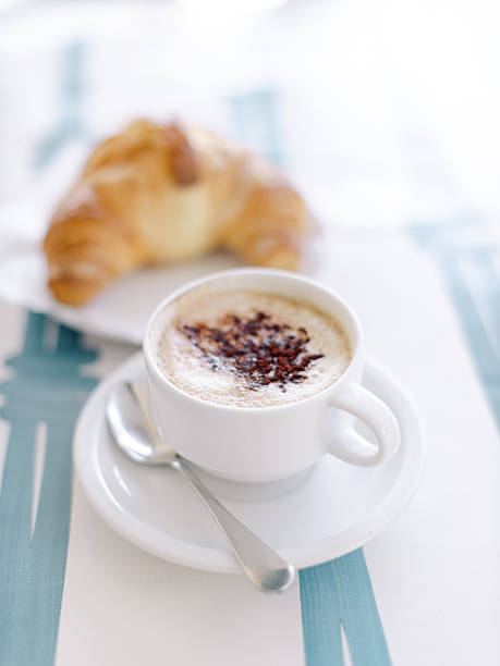 Italian breakfast cappuccino and croissant in Sorrento, Campania, Italy