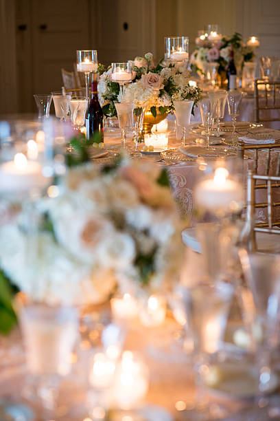 istock Elegant Candlelit Wedding Reception Table with Floral Centerpiec 2246270346