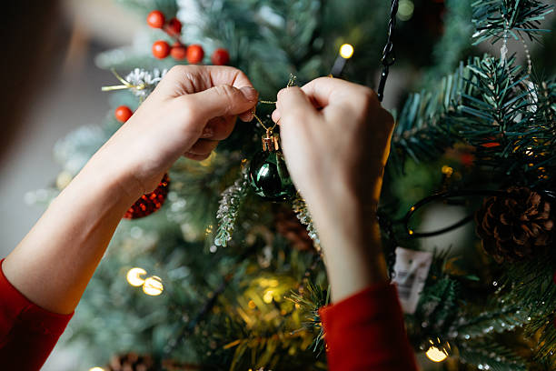 istock Preparing for the Holiday Season with Tree Decorations 2246271394