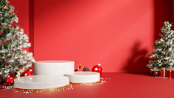 istock White round marble display platforms and Christmas tree with ornament and snowball in red background 2246274958