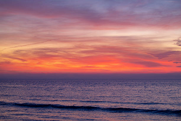 istock Sunrise Clouds background. Dramatic Clouds Sunset Background. Sky with clouds in Sunrise. Sunrise with clouds in various shapes background. Calm Cloud. 2246284968