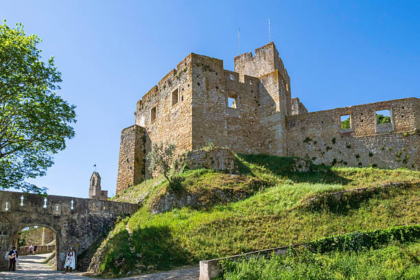 Obidos, Portugal - July 28 2019:  Medieval Fair:  view of the castle, tower and stone walls