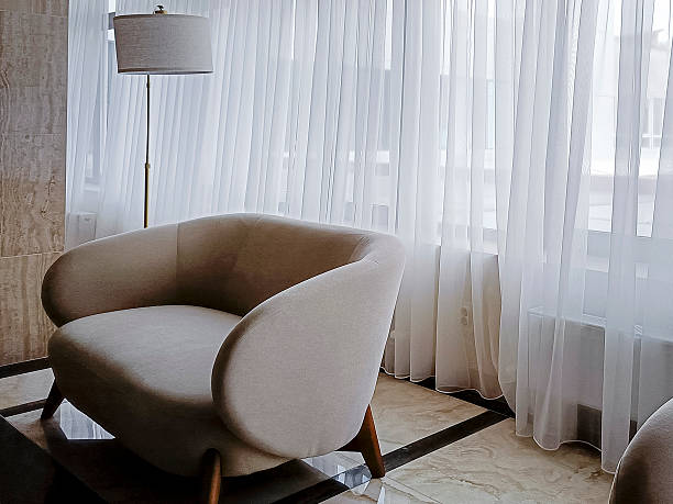 istock A hall with soft armchairs and a large window. 2246292448