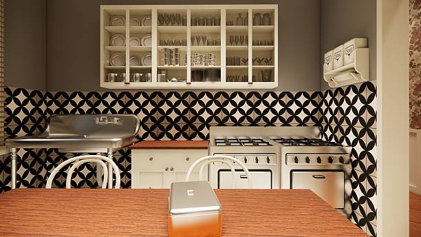 istock Empty kitchen island with marble surface in foreground, green vintage countertop with drawers .A traditional dutch clean domestic kitchen. 2246294173