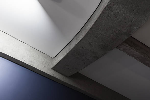 istock A striking interior detail featuring curved concrete beams crossing white panels 2246297638
