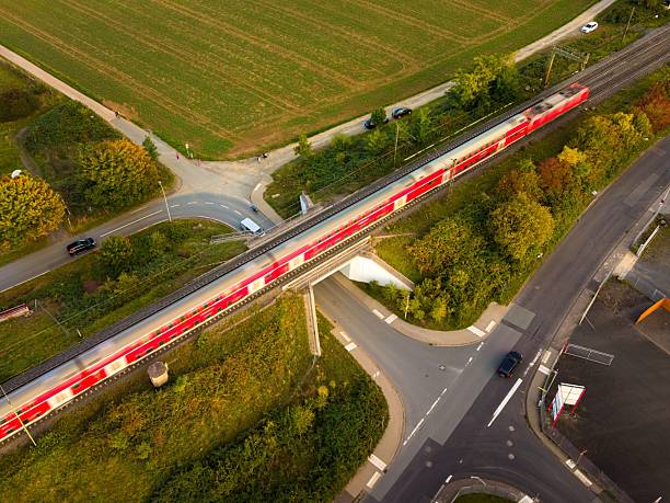 istock Aerial view of train crossing a landscape. 2246300019
