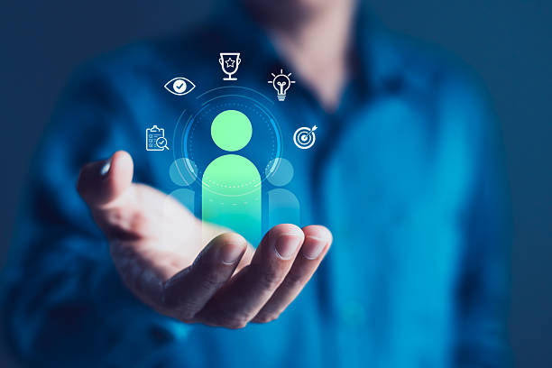 istock Digital recruitment and candidate selection concept with businessman holding smartphone and virtual screen highlighting approved person icon for hiring 2246301574