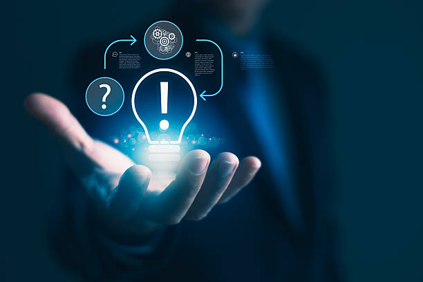 istock Businessman hand holding glowing idea bulb icon with infographic design for innovation, creative thinking, problem solving, and business intelligence strategy 2246302028