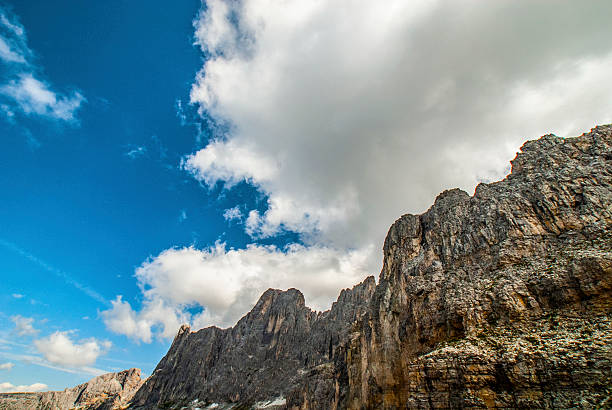 Rosengarten also called Catinaccio mountain range in the Dolomites of South Tyrol (Alto Adige) during autumn. The Vajolet Towers and the rock face of mount Laurin Wand. The Rosengarten is part of the UNESCO world heritage site Dolomites. Europe, Central Europe, Italy, South Tyrol, Summer 2021