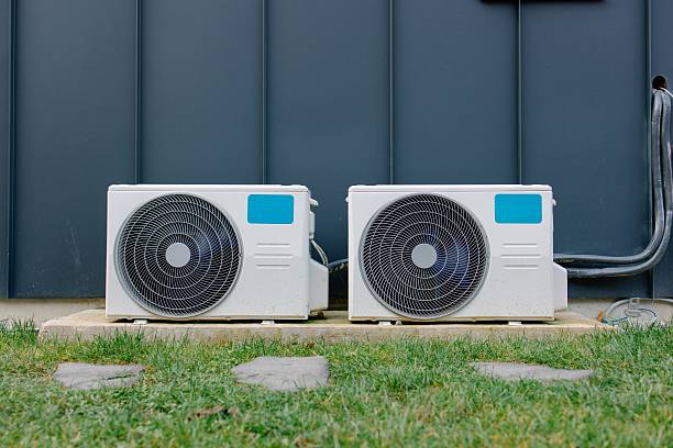 istock Outdoor air conditioning units on a concrete base. 2246303907