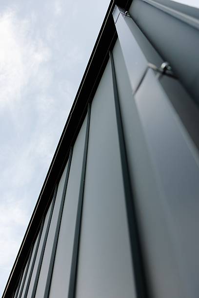 Modern building corner featuring sleek metal siding
