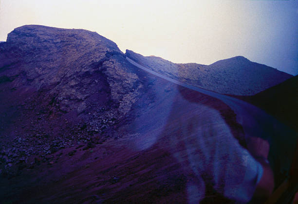 Lanzarote, Canary Islands, Spain, July 14, 1999. The island is of volcanic origin, with major eruptions occurring between the 18th and 19th centuries. Between the center and southwest of the island lies the vast Timanfaya National Park, entirely on volcanic soil. In the photo, taken from a moving bus, the 14-kilometer road, called the \