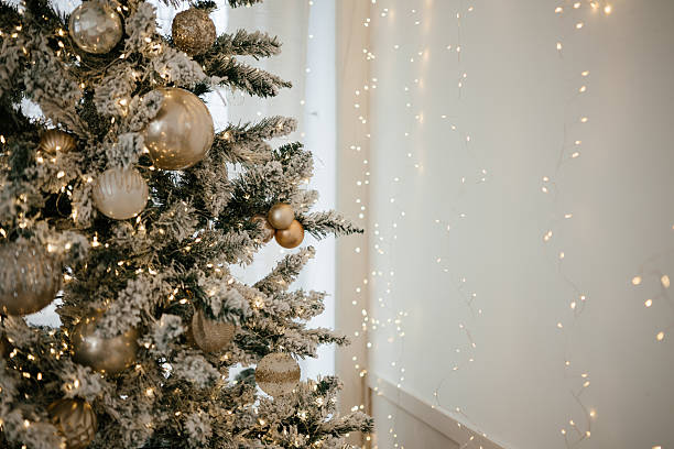 Elegant Christmas Tree with Gold Decorations