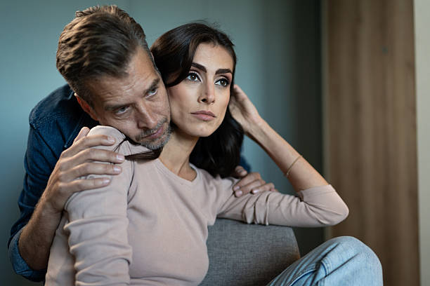 istock Husband comforting sad wife after relationship conflict 2246310163