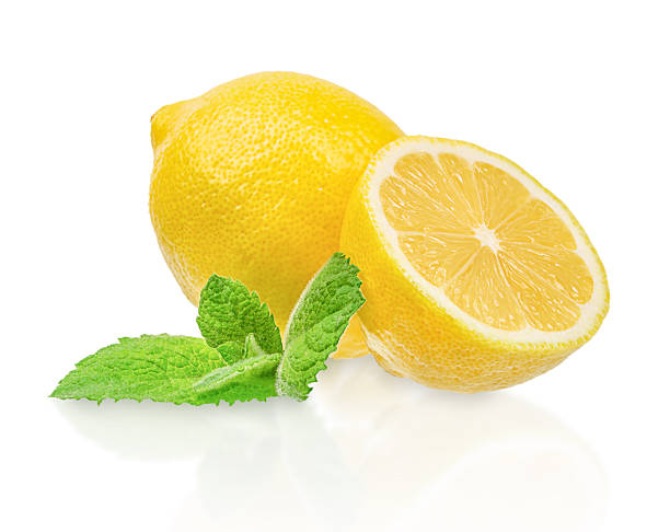 istock Fresh lemon with half cut and green mint leaves isolated on white background, citrus fruit with vibrant color and copy space for text, healthy food concept for advertising or banner 2246314088