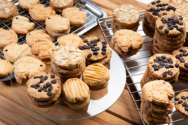 istock Crunchy cookie with chocolate chips on rustic table dessert vibe, golden baked round biscuit stack, buttery crumb, sweet aroma, homemade treat for snack time joy 2246319349