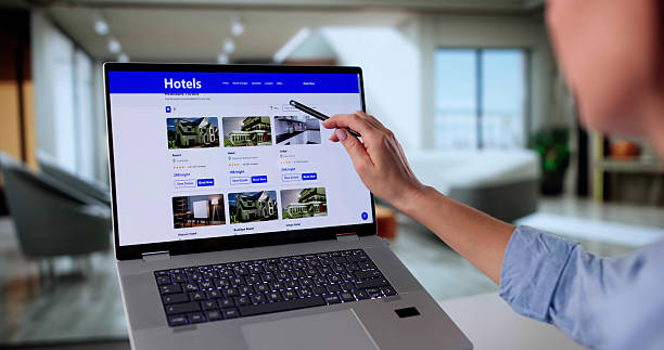 istock Woman Researching Hotels Online For Work Trip 2246330748
