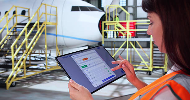 istock Aerospace Engineer Ensuring Aircraft Safety With Tablet Inspection 2246331109