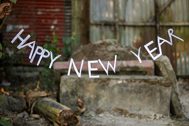 istock Happy new year banner strung across a rustic outdoor setting 2246337602