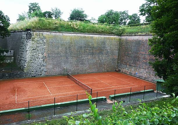 Tennis court near historic wall in Prague