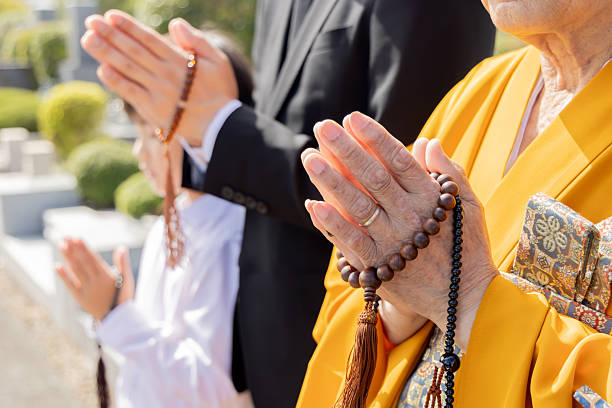 istock Asian family visiting the grave 2246340246