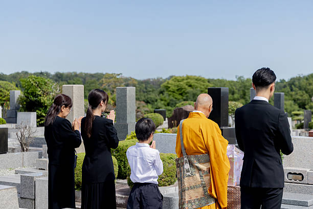 istock Buddhist priests and bereaved family members attending the interment ceremony 2246341858