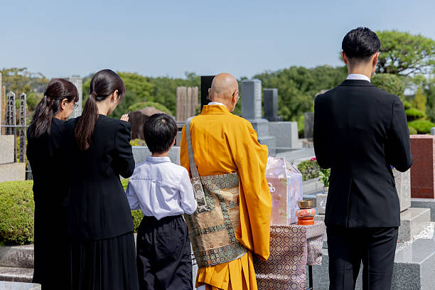 istock Buddhist priests and bereaved family members attending the interment ceremony 2246341864