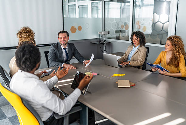 istock Business professionals discussing strategy at office meeting 2246342297