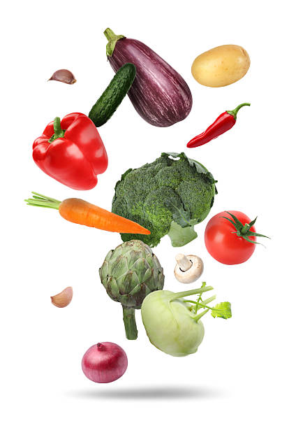 istock Different fresh vegetables in air on white background 2246343356