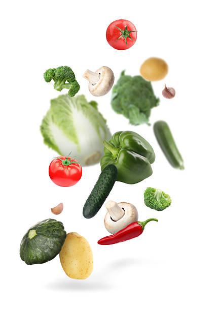 istock Different fresh vegetables in air on white background 2246343378